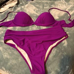 Like new XL bikini. Bought but never worn. Really nice purple color.